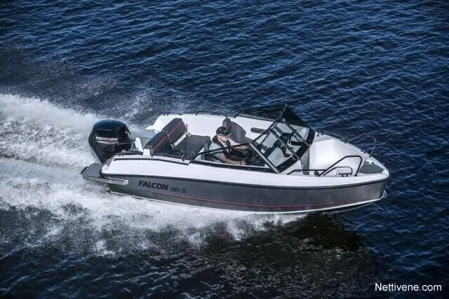 A Falcon BR 5 boat with a Mercury outboard engine speeds through water, showcasing its sleek design and sunny weather.